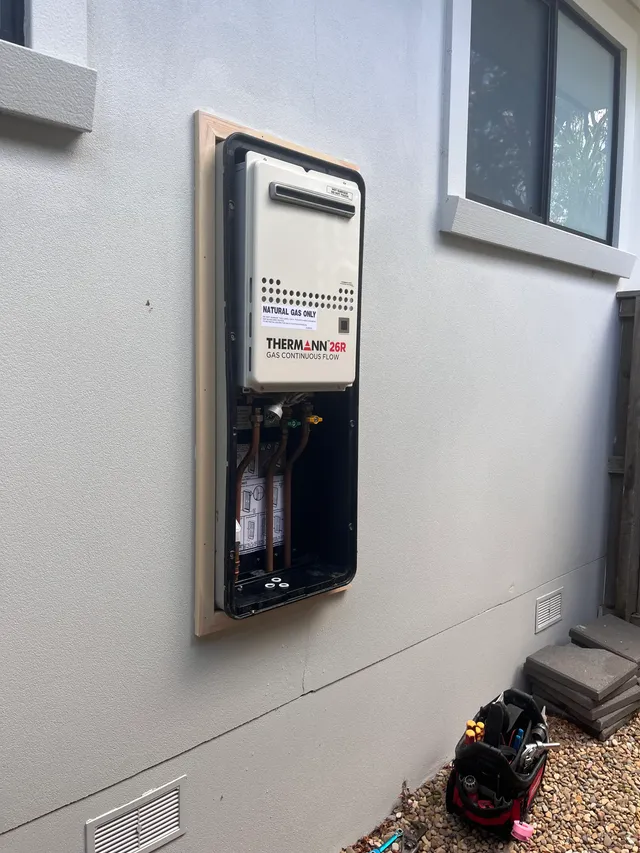 Thermann gas unit being serviced on location