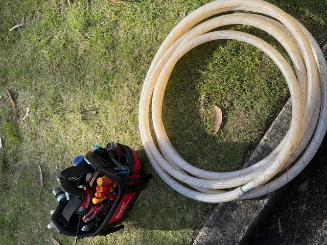 Tools on the ground at a hot water repair job