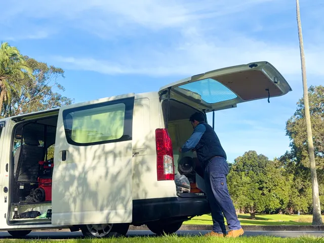 Unloading the Bondi Hot Water van at a job site